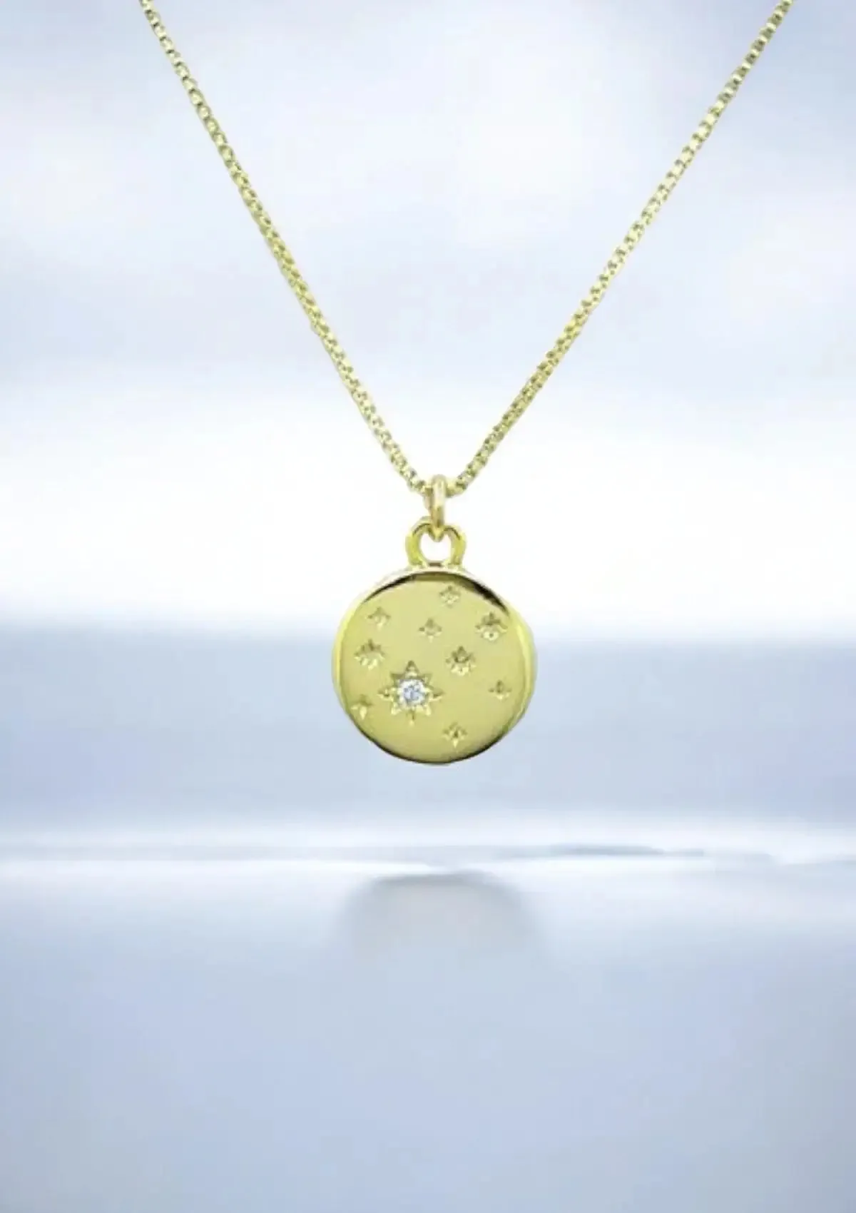 Round Celestial Charm with Stars